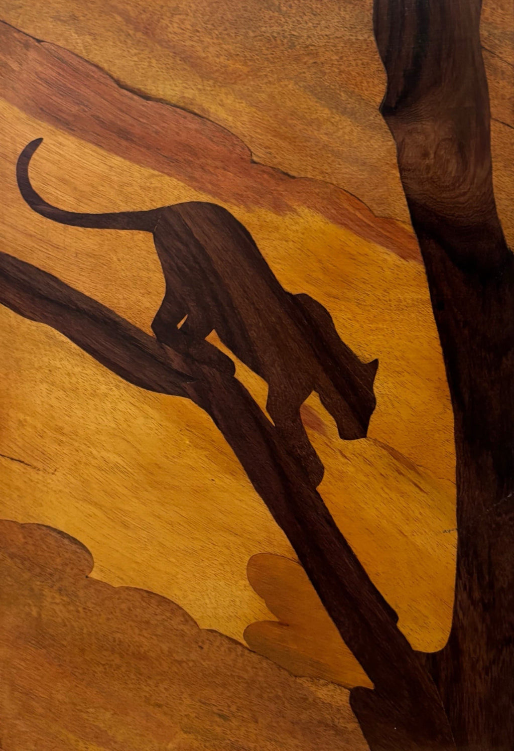 Still Movement: Big cat in wood inlay by Mohan Kumar Thumbnail