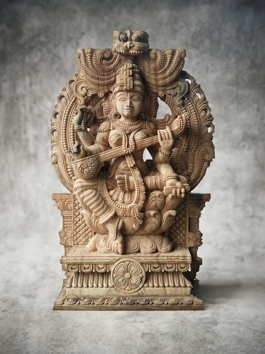 Sarasvati Ji in Wood Carving by K.P. Dharmaian