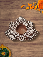 Buy finely carved leaf-shaped tea light