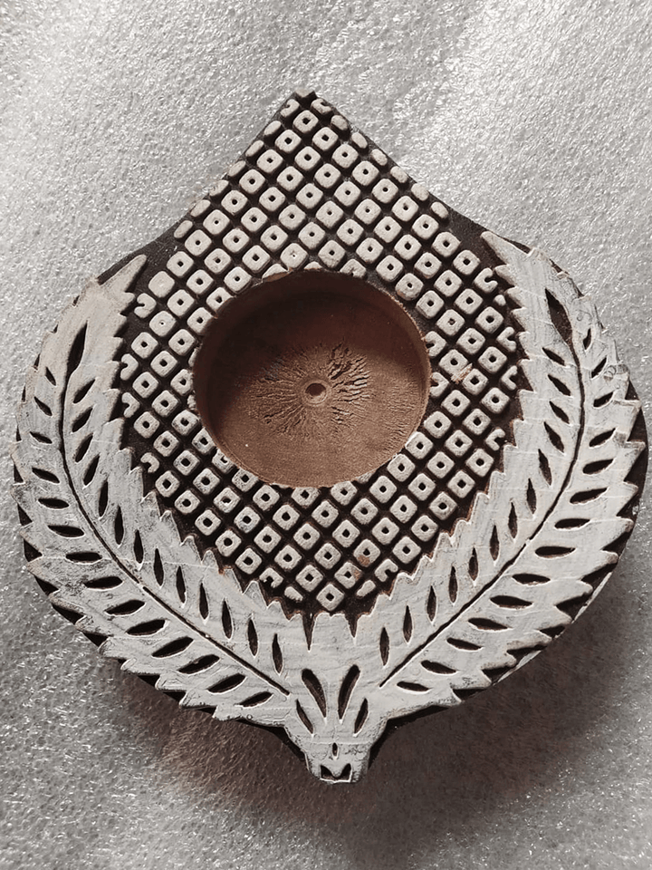 Leaf Shaped China Berry Wooden Block Diya Set by Vikas Singh Thumbnail